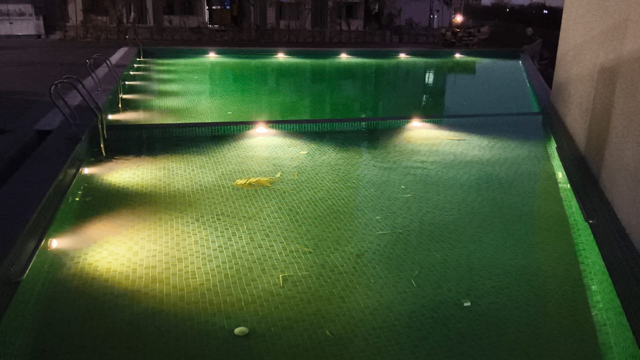 Swimming pool with underwater lights